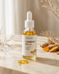 Turmeric Dark Spot Serum overhead flat-lay with turmeric slices
