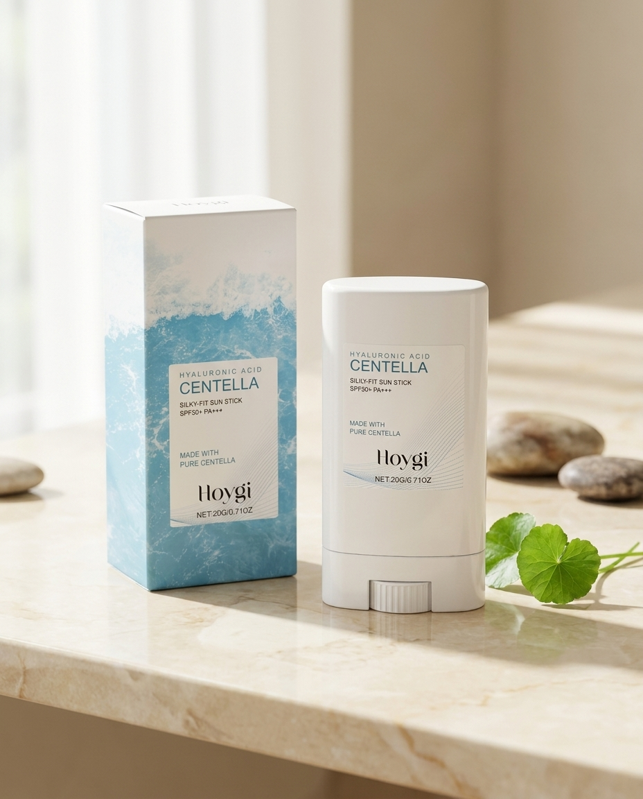 Silky-Fit Daily Sun Stick SPF50+ on marble with centella leaf