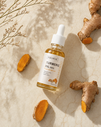 Turmeric Dark Spot Serum macro close-up with golden oil droplet
